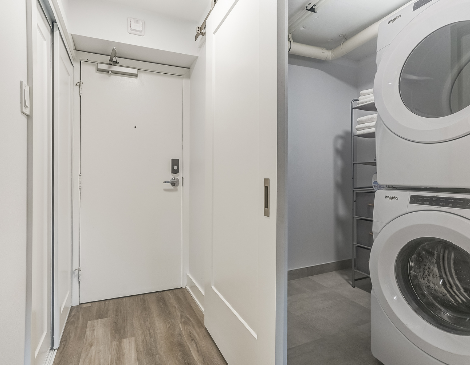 Laundry room of a one bedroom suite at Elora.
